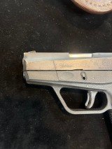 TAURUS 709 SLIM FS 9MM LUGER (9x19 PARA) - 2 of 3
