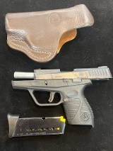TAURUS 709 SLIM FS 9MM LUGER (9x19 PARA) - 1 of 3