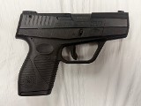 TAURUS PT709 Slim 9MM LUGER (9x19 PARA) - 1 of 3