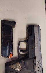 TAURUS PT140 MILLENNIUM G2 40 Smith & Wesson - 1 of 2