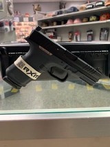RUGER RXM 9MM LUGER (9x19 PARA) - 1 of 3
