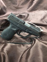 TAURUS 709 Slim 9MM LUGER (9x19 PARA) - 2 of 3