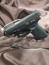 TAURUS 709 Slim 9MM LUGER (9x19 PARA) - 1 of 3