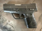 TAURUS PT-740 SLIM 40 Smith & Wesson - 2 of 3