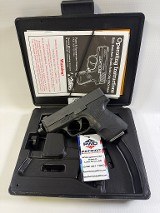 KAHR ARMS PM9 9MM LUGER (9x19 PARA) - 1 of 3