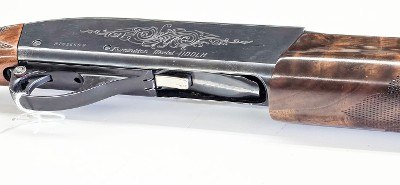 REMINGTON LEFT-HANDED 1100 SEMI-AUTO CHAMBERED IN 12 GAUGE HAS SOME HISTORY BEHIND IT !! 12 GA - Image 1 of 3