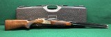 MOSSBERG GOLD RESERVE 12 GA - 1 of 3