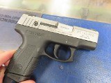 TAURUS PT140 PRO MILLENIUM .40 S&W - 1 of 3