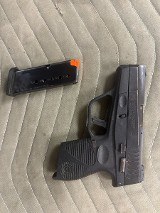 TAURUS PT740 SLIM (1-740031FDE) 40 Smith & Wesson - 1 of 2