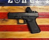 GLOCK Glock 19 Gen 5, 4.02" Barrel, Black, 9mm Semi Auto Pistol. Trijicon SRO 5.0 MOA. 9MM LUGER (9x19 PARA) - Image 1 of 1