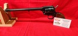 Colt Buntline Scout in .22LR 9.5" Barrel - 1 of 13