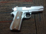 Colt Combat Commander.
Satin Nickel 9mm - 2 of 11