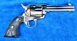 Colt SAA with 4 3/4" Barrel Marked "COLT FRONTIER SIX SHOOTER." 44-40 Cal., Nickel Finish with Black Eagle Grips, New In Box - 4 of 12