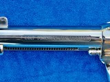 Colt SAA with 4 3/4" Barrel Marked "COLT FRONTIER SIX SHOOTER." 44-40 Cal., Nickel Finish with Black Eagle Grips, New In Box - 3 of 12