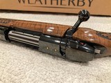 NIB Custom weatherby Mark V .257 WBY Magnum incredible wood lazermark. NEVER FIRED - 12 of 15