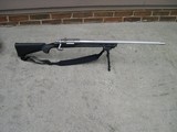 Remington Model 700, .223 w/ 26 in. Fluted Stainless Barrel - 1 of 13