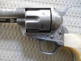 Colt SAA .45 4.75 inch
engraved carved pearl grips - 2 of 9