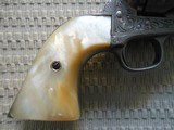Colt SAA .45 4.75 inch
engraved carved pearl grips - 6 of 9