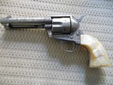 Colt SAA .45 4.75 inch
engraved carved pearl grips - 1 of 9