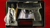 Taurus PT-709, 9mm, Like New with Case - 1 of 13