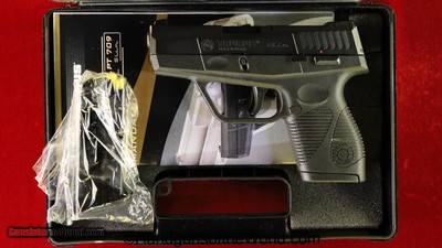 Taurus PT-709, 9mm, Like New with Case
