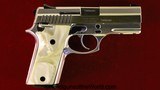 Taurus PT911, 9mm, Stainless with Pearlite Grips - Image 2 of 9