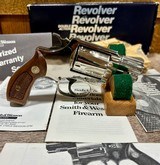 Smith and Wesson 36 Nickel NIB Unfired With All Paperwork And Cleaning Brush - 8 of 9