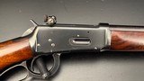 Winchester Model 64 .30 WCF Lever Action Rifle, 24" Barrel, Redfield Adjustable Rear Sight,
(Mfg. 1941)
FINE Condition - 12 of 15