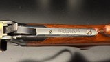 Winchester Model 64 .30 WCF Lever Action Rifle, 24" Barrel, Redfield Adjustable Rear Sight,
(Mfg. 1941)
FINE Condition - 9 of 15