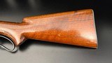 Winchester Model 64 .30 WCF Lever Action Rifle, 24" Barrel, Redfield Adjustable Rear Sight,
(Mfg. 1941)
FINE Condition - 7 of 15