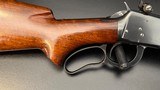 Winchester Model 64 .30 WCF Lever Action Rifle, 24" Barrel, Redfield Adjustable Rear Sight,
(Mfg. 1941)
FINE Condition - 13 of 15