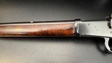 Winchester Model 64 .30 WCF Lever Action Rifle, 24" Barrel, Redfield Adjustable Rear Sight,
(Mfg. 1941)
FINE Condition - 4 of 15