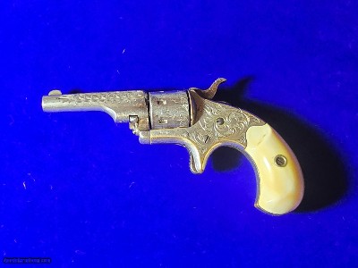 Colt Open Top Factory engraved Nickel. 22 rf