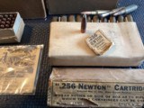 256 Newton cartridges 40 loaded and 26 pieces of brass and 50 vintage hollow .point256/6.5 bullets along with some Newton cardboard in rough condition - 2 of 3