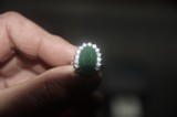 Beautiful Emerald Womans Ring with Faux Diamond Accents - 1 of 2