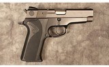 Smith & Wesson~model 910~9 mm - 1 of 3