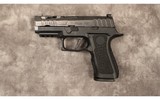 Sig Sauer~P320 custom works~9 mm - 2 of 3