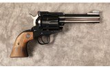 Ruger~New Model Blackhawk~45 Colt - 1 of 2