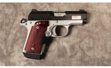 Kimber~Micro 9 Crimson trace~9 mm - 1 of 2