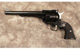 Ruger~new model blackhawk~30 carbine - 2 of 3
