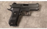 Sig Sauer~p220 dark elite~45 ACP - 1 of 3