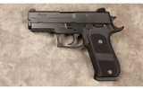 Sig Sauer~p220 dark elite~45 ACP - 2 of 3