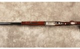 Mossberg~silver reserve~12 gauge - 10 of 10