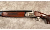 Mossberg~silver reserve~12 gauge - 6 of 10