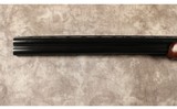 Mossberg~silver reserve~12 gauge - 7 of 10