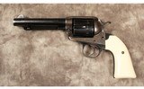 Ruger~bisley model vaquero~44 magnum - 2 of 2