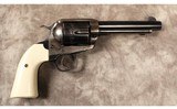 Ruger~bisley model vaquero~44 magnum - 1 of 2