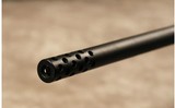 Remington~model 700~338 win mag - 8 of 10