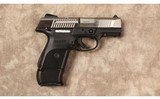 Ruger~SR9C~9 MM - 1 of 2