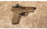 Springfield~Hellcat Pro~9 MM - 1 of 2